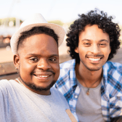 Two friends smiling at camera