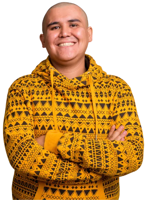 Happy man with arms crossed smiling at camera