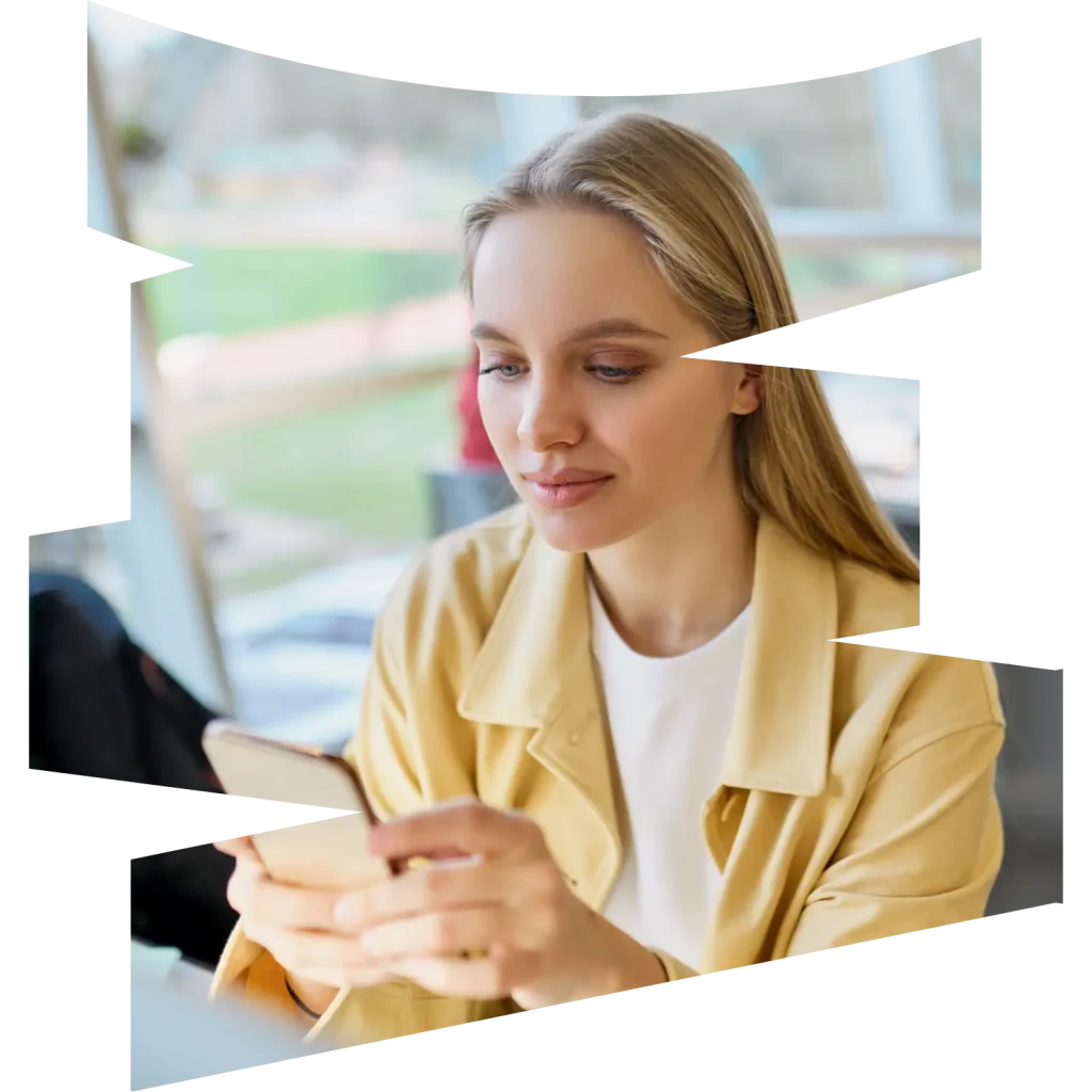 Woman in Yellow blazer using mobile phone