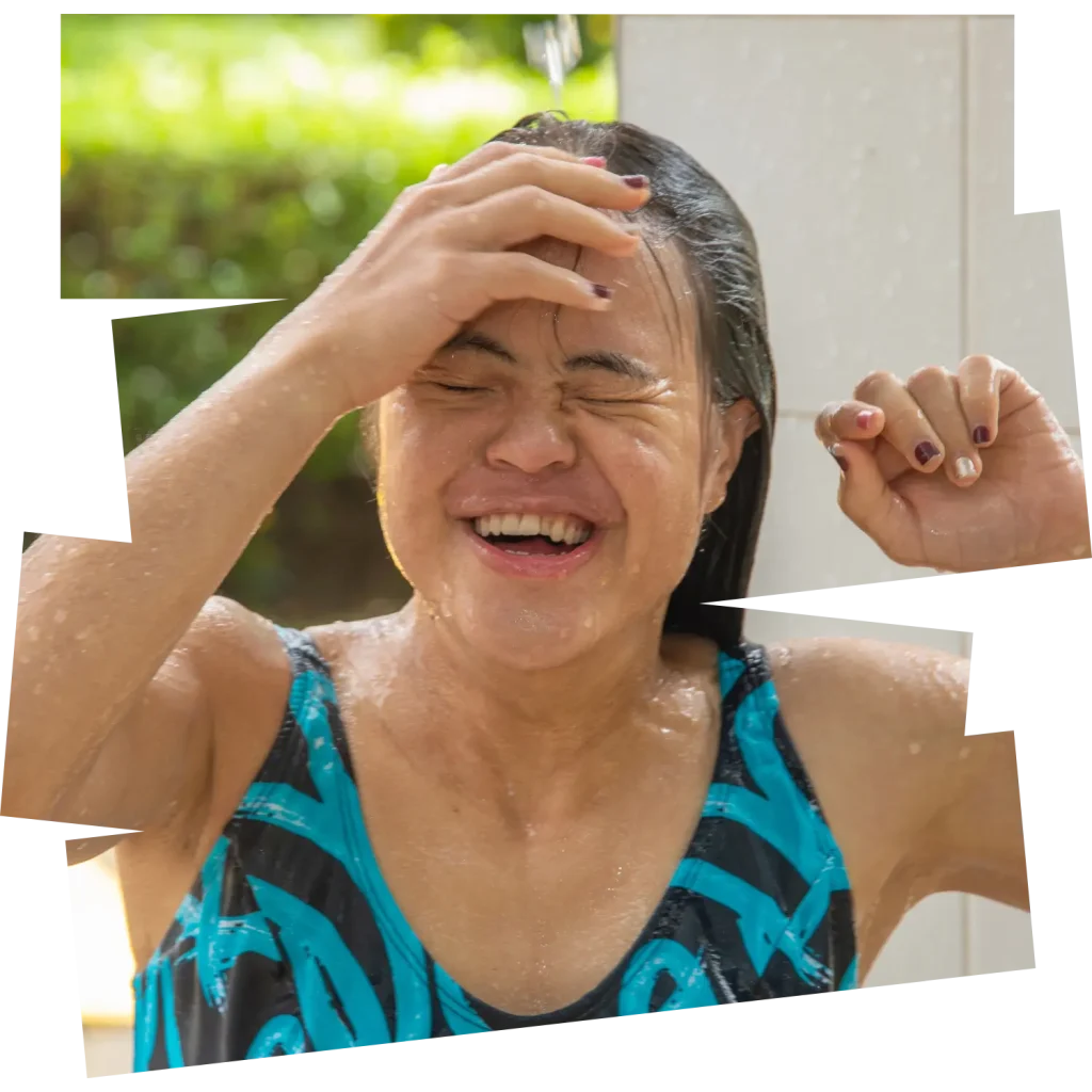 Happy girl in bathers laughing