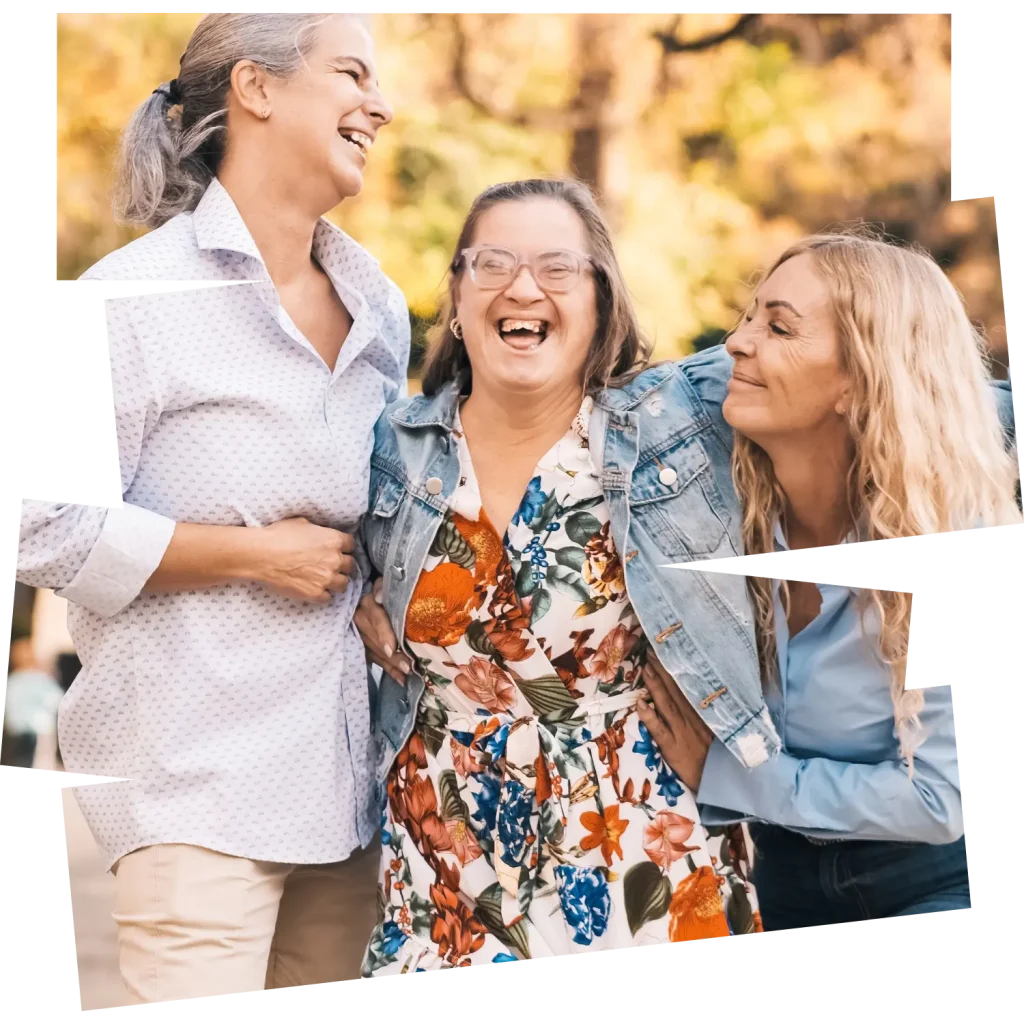 Disabled woman laughing with two friends